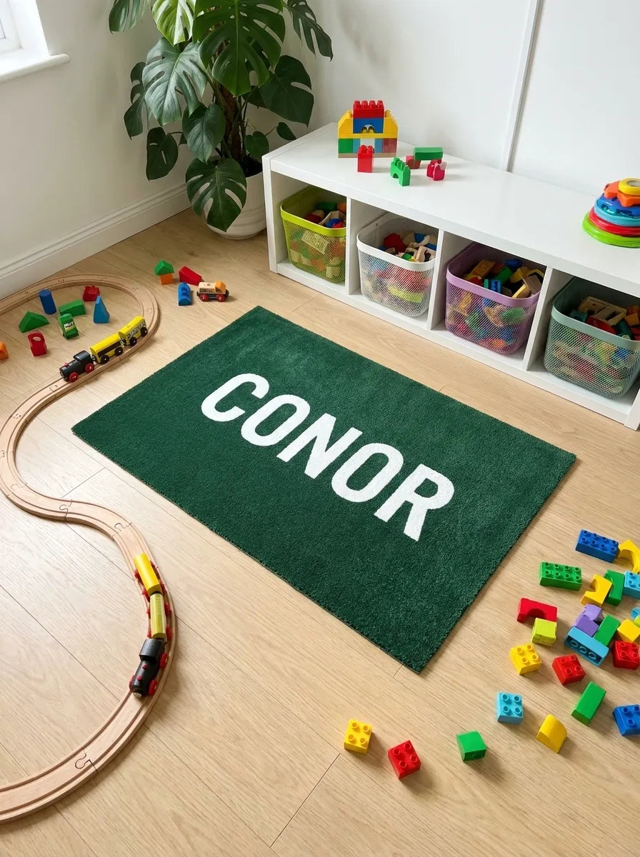 Two kids name mats, blue and pink